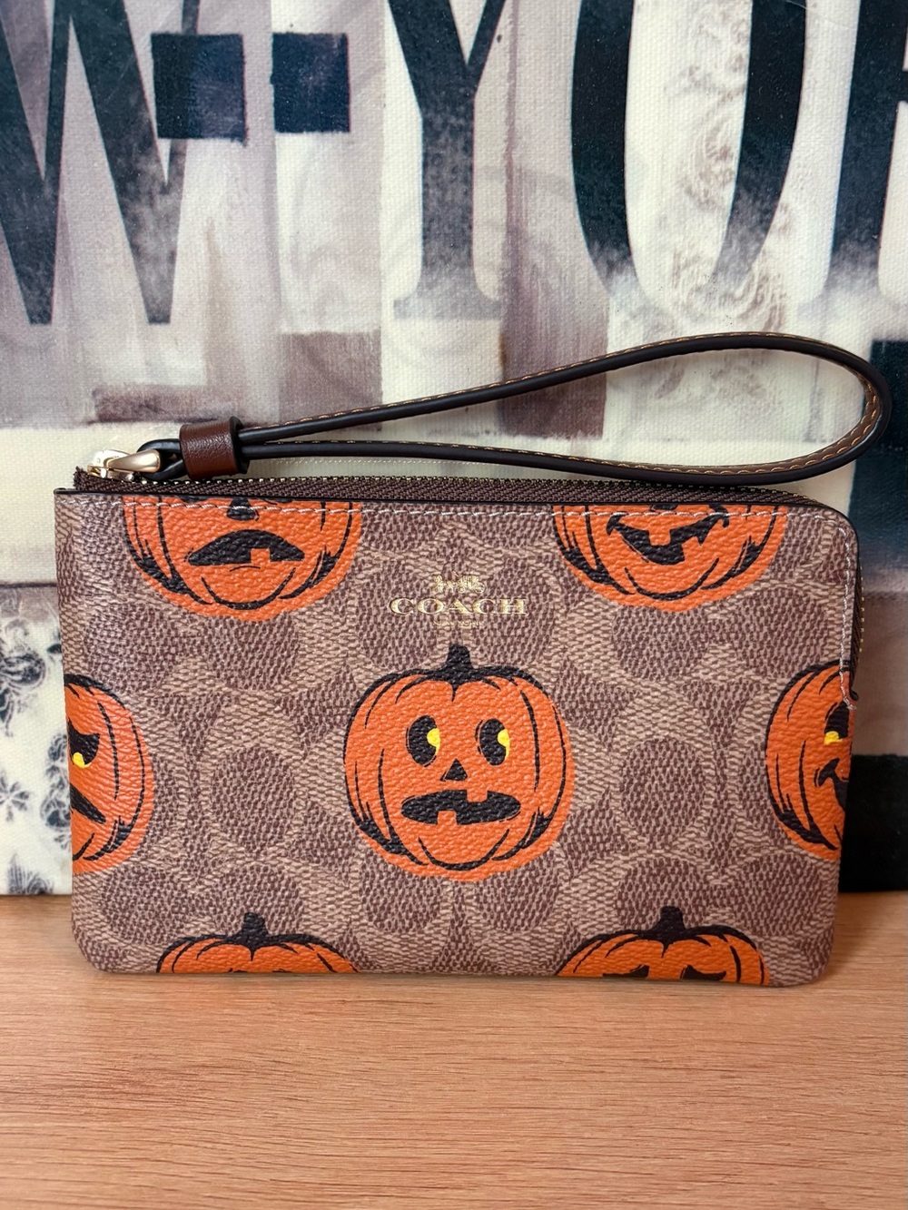 Coach Corner Zip Wristlet In Signature Halloween Pumpkin Print